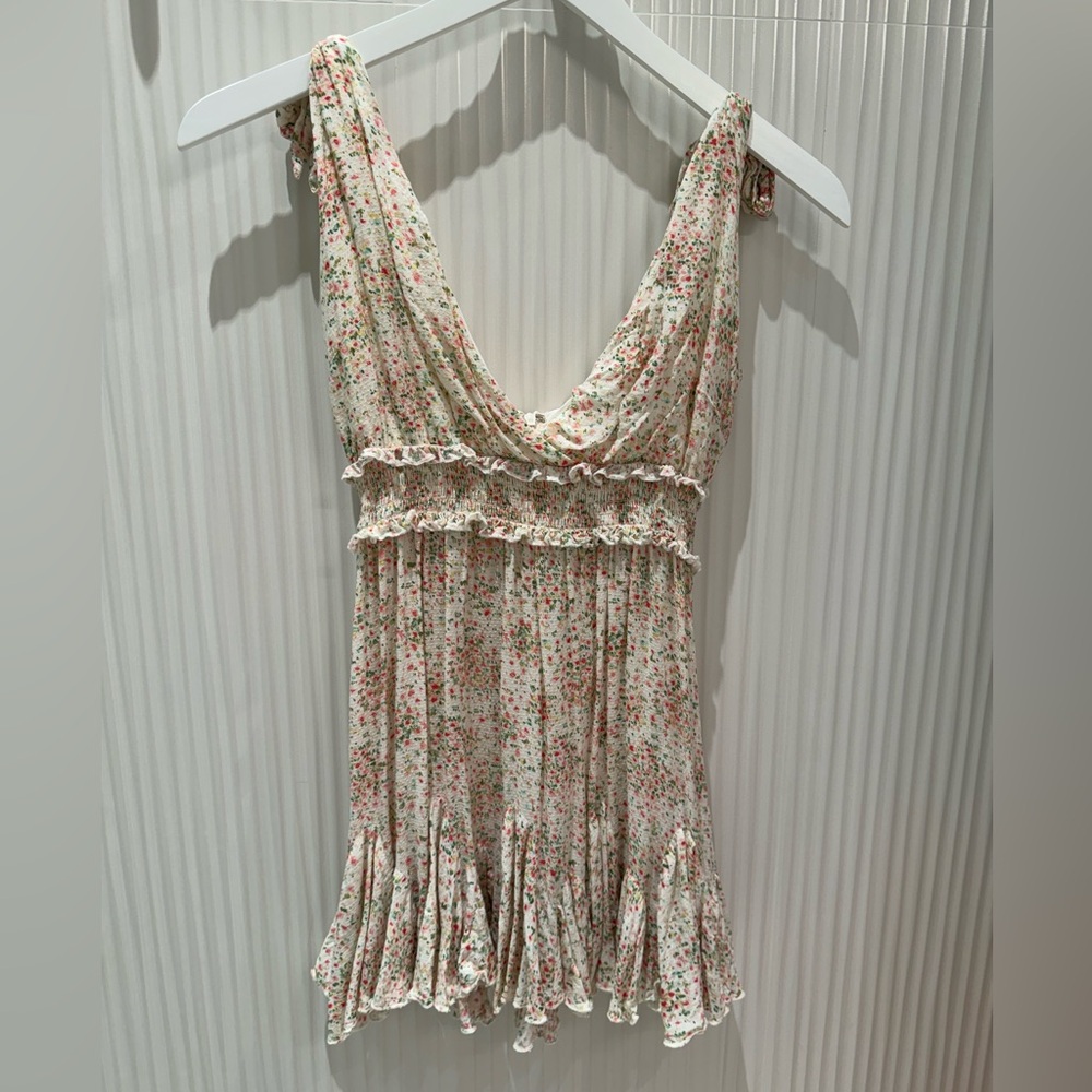 This is a Skylar + Madison cream and colorful dots dress.